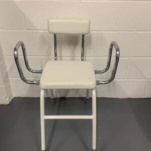 A white chair with arms on the back.