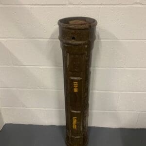 A brown pipe sitting on top of a table.