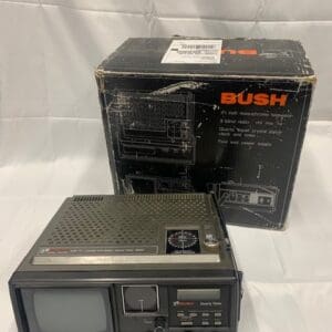 A bush television with box on top of it