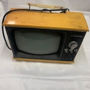 A small television sitting on top of a table.