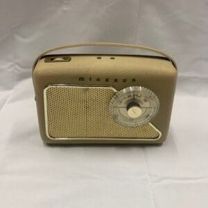 A radio sitting on top of a table.