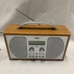 A radio is sitting on top of the table.