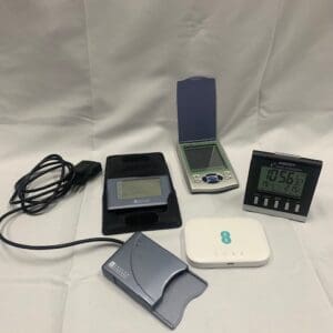 A group of electronic devices sitting on top of a table.