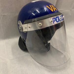 A police helmet with a visor on top of it.