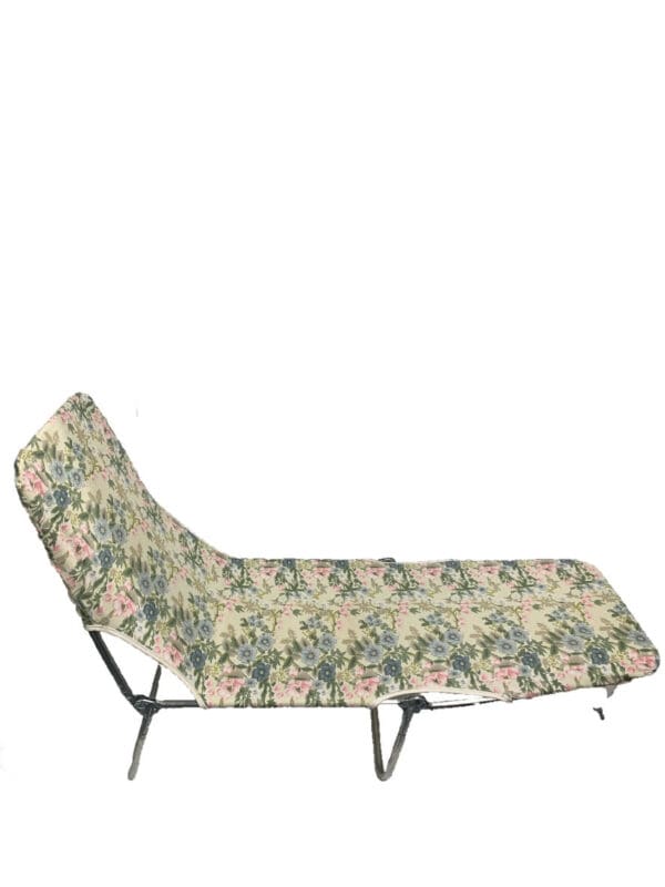 A folding chair with a floral pattern on it.