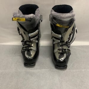 A pair of ski boots with fur on them.