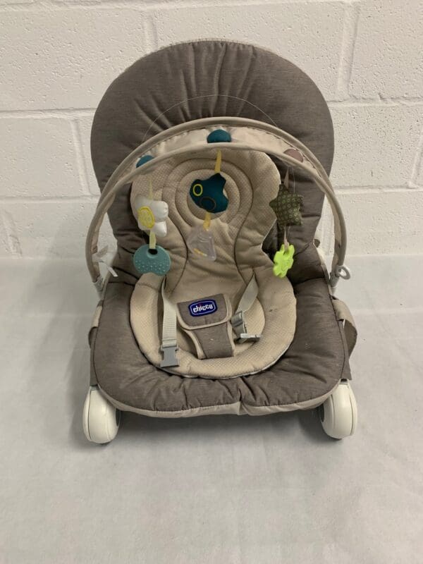 Chicco baby bouncer with toy bar.