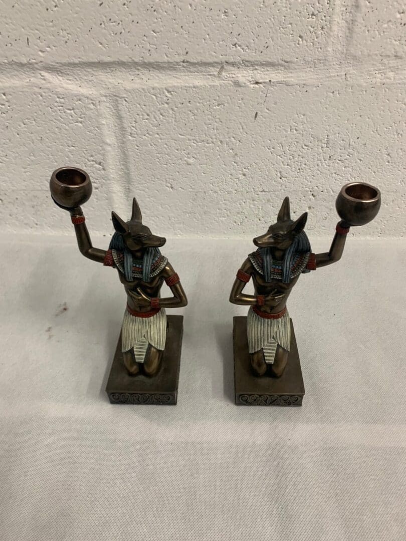 Anubis candle holders, Egyptian statues.